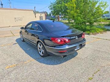 2011 Volkswagen Passat VIN WVWHN9AN1BE706967 COPART salvage auction — NORMAL WEAR, On - Permit No Brand - Unfit (P), sold $925 on 2026-08-04 (photo 3)