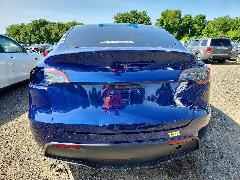 2022 Tesla Model y VIN 7SAYGDEEXNF418605 COPART salvage auction — REAR END, CT - CERT OF TITLE-SALVAGE, sold $12,200 on 2026-07-23 (photo 6)
