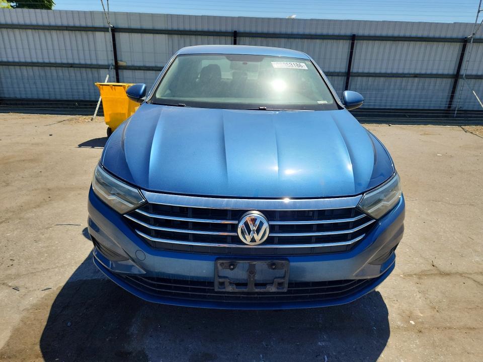 2019 Volkswagen Jetta VIN 3VWC57BUXKM090701 COPART salvage auction — NORMAL WEAR, Ca - Dis/Dlr/Exp Only Clean Title, sold $3,300 on 2026-08-14 (photo 5)