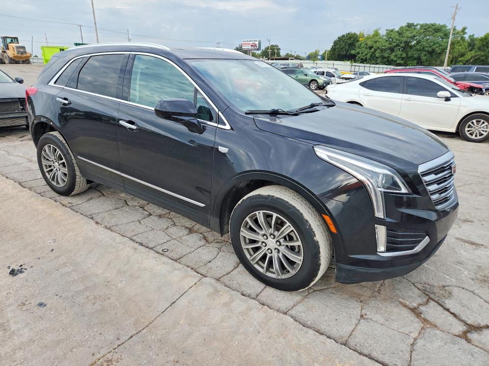 2017 Cadillac Xt5 VIN 1GYKNDRS5HZ124286 COPART salvage auction — NORMAL WEAR, OK - CERTIFICATE OF TITLE, sold $6,000 on 2026-08-25 (photo 4)