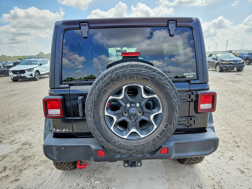 2023 Jeep Wrangler / VIN 1C4HJXFN0PW598657 COPART salvage auction — FRONT END, Tx - Salvage Vehicle Title, sold $11,300 on 2026-07-31 (photo 6)