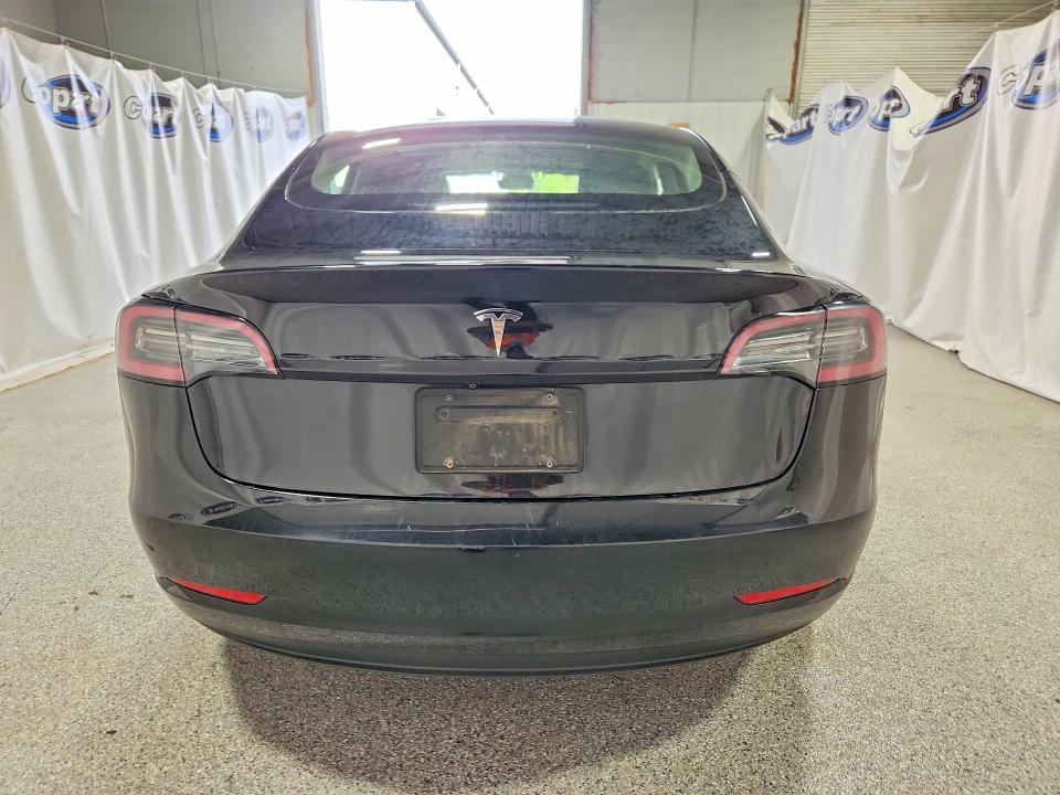 2022 Tesla Model 3 VIN 5YJ3E1EA0NF369004 COPART salvage auction — MECHANICAL, Fl - Certificate Of Title, sold $8,100 on 2026-08-03 (photo 6)