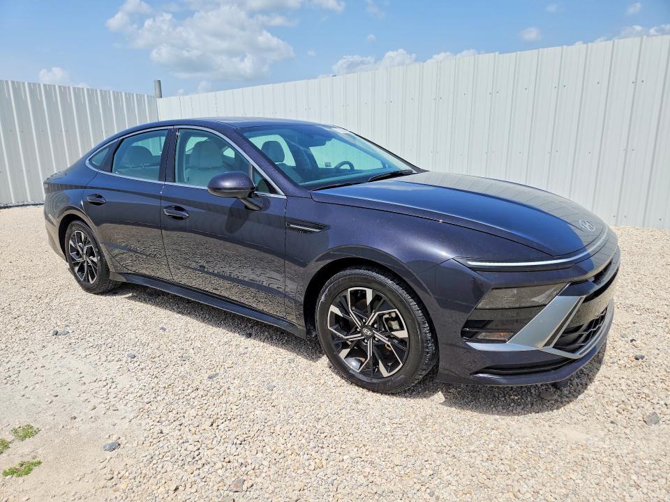 2025 Hyundai Sonata VIN KMHL64JA7SA497776 COPART salvage auction — WATER/FLOOD, Fl - Cert Of Title-Slvg Rebld Flood (P), sold $11,600 on 2026-07-27 (photo 4)