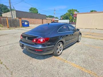 2011 Volkswagen Passat VIN WVWHN9AN1BE706967 COPART salvage auction — NORMAL WEAR, On - Permit No Brand - Unfit (P), sold $925 on 2026-08-04 (photo 4)