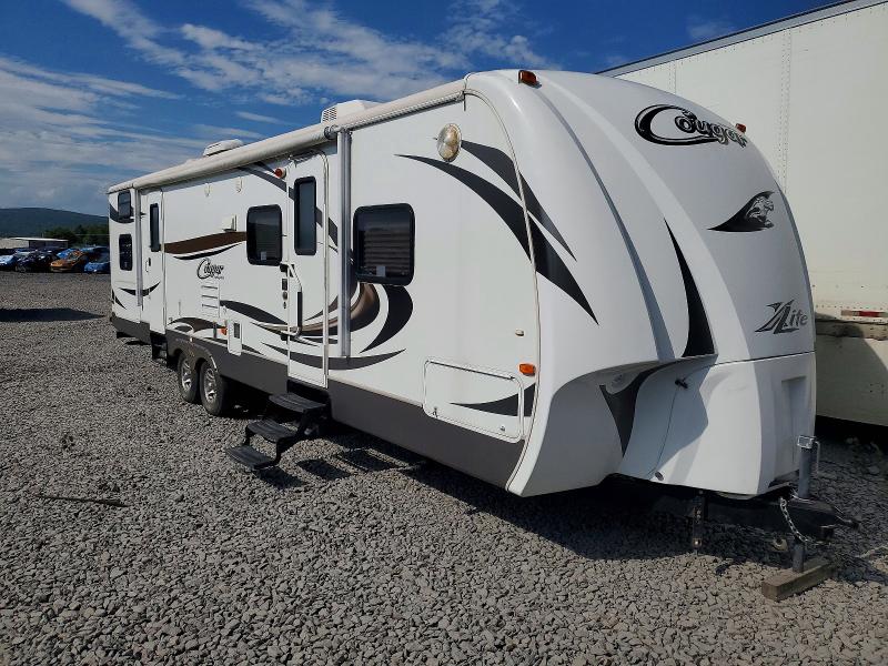 2012 Cougar Trav trail VIN 4YDT31S25CV503441 COPART salvage auction — REAR END, PA - CERTIFICATE OF SALVAGE, sold $1,700 on 2026-07-23 (photo 1)