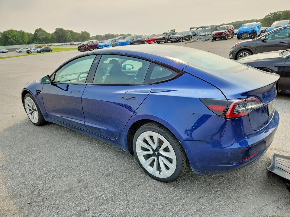 2022 Tesla Model 3 VIN 5YJ3E1EA0NF290318 COPART salvage auction — UNDERCARRIAGE, Fl - Certificate Of Title, sold $4,400 on 2026-07-22 (photo 2)