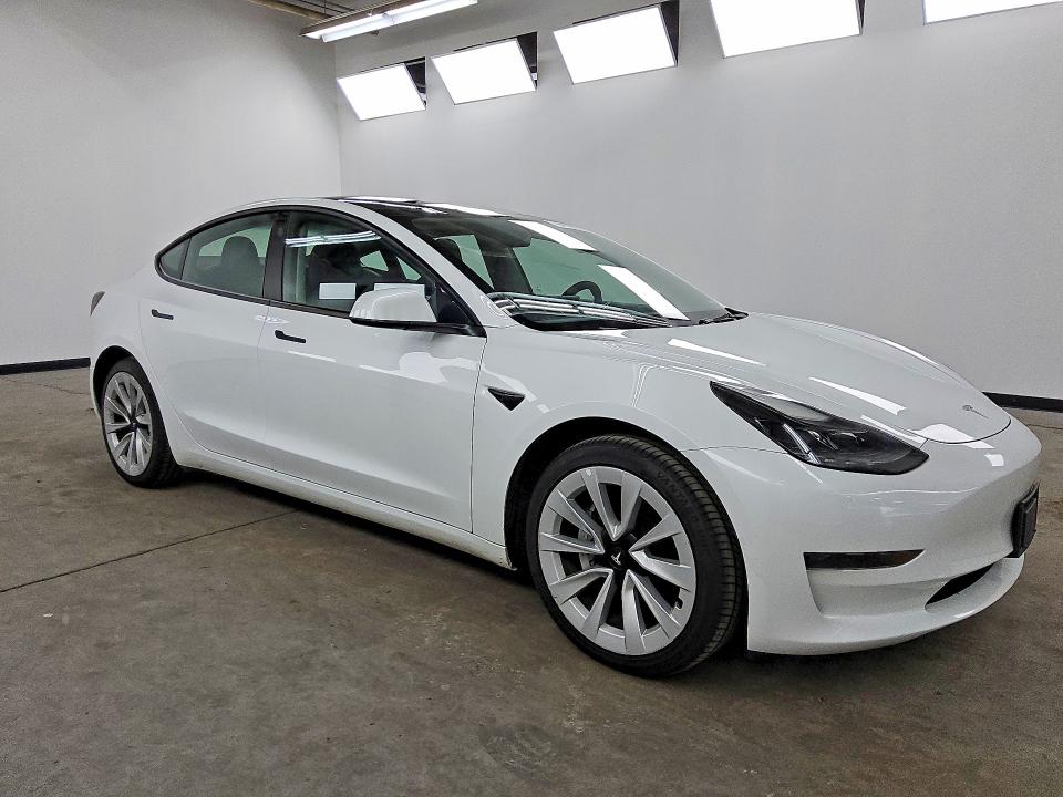 2023 Tesla Model 3 VIN 5YJ3E1EAXPF452121 COPART salvage auction — SIDE, CT, sold $10,900 on 2026-07-20 (photo 4)