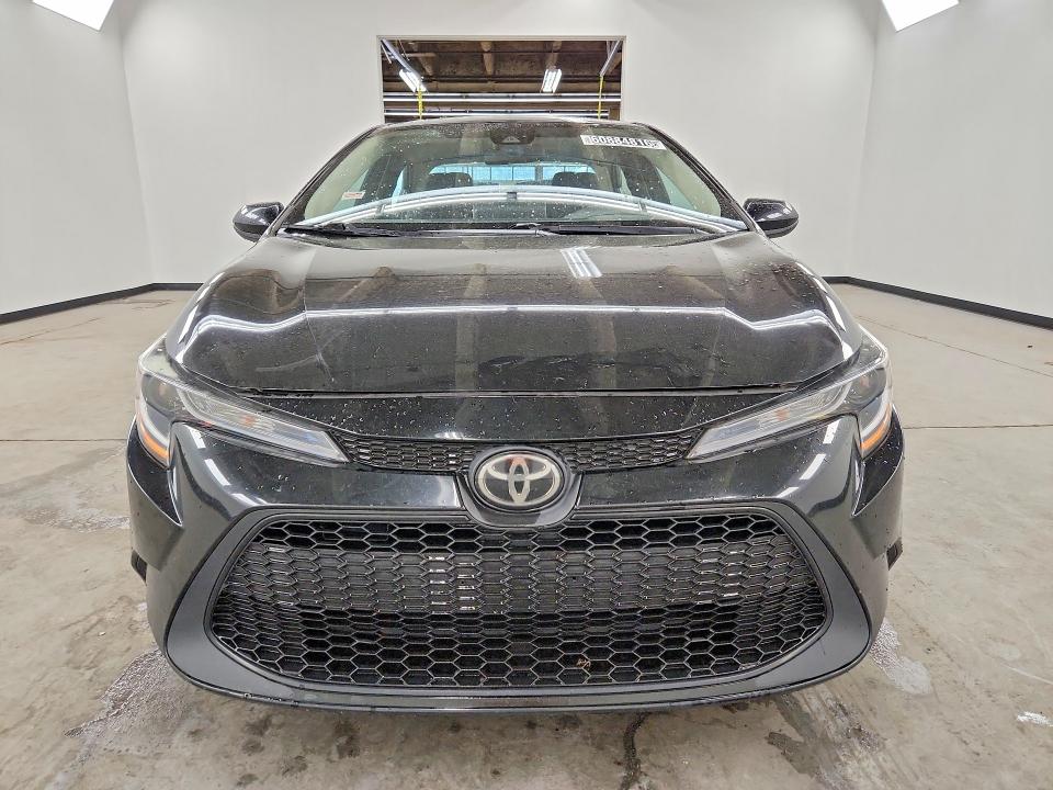 2021 Toyota Corolla VIN 5YFEPMAE7MP209198 COPART salvage auction — SIDE, Fl - Certificate Of Title, sold $1,100 on 2026-07-22 (photo 5)