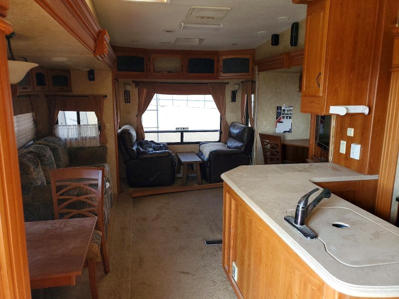 2010 Foresriver Wyoming su VIN 5ZT3WS1B2A1301242 COPART salvage auction — SIDE, TX - SALVAGE VEHICLE TITLE, sold $3,050 on 2026-07-27 (photo 6)