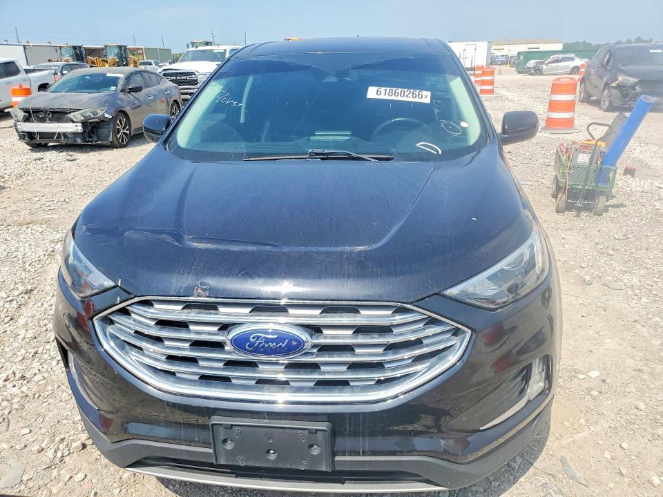 2022 Ford Edge VIN 2FMPK4J9XNBA55134 COPART salvage auction — MINOR DENT/SCRATCHES, Tx - Certificate Of Title, sold $8,100 on 2026-08-18 (photo 5)