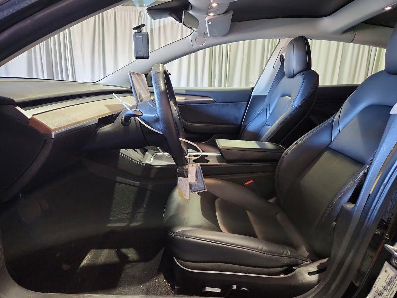 2022 Tesla Model 3 VIN 5YJ3E1EA1NF304663 COPART salvage auction — SIDE, Wa - Vehicle Cert Of Ownership-Titl, sold $6,100 on 2026-08-03 (photo 7)