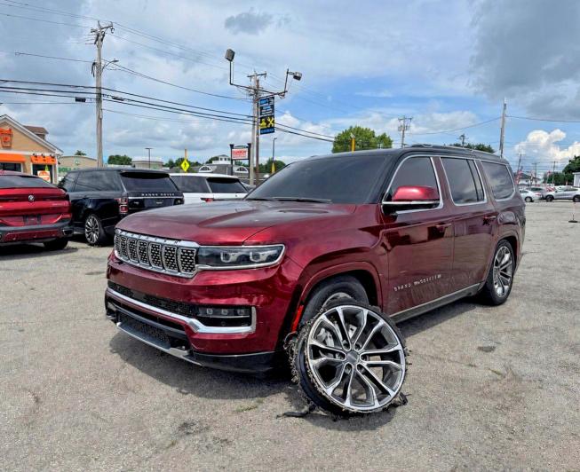 2022 Jeep Grand wago VIN 1C4SJVGJ2NS144713 COPART salvage auction — NORMAL WEAR, MI - CERTIFICATE OF TITLE (P), sold $25,250 on 2026-07-28 (photo 2)