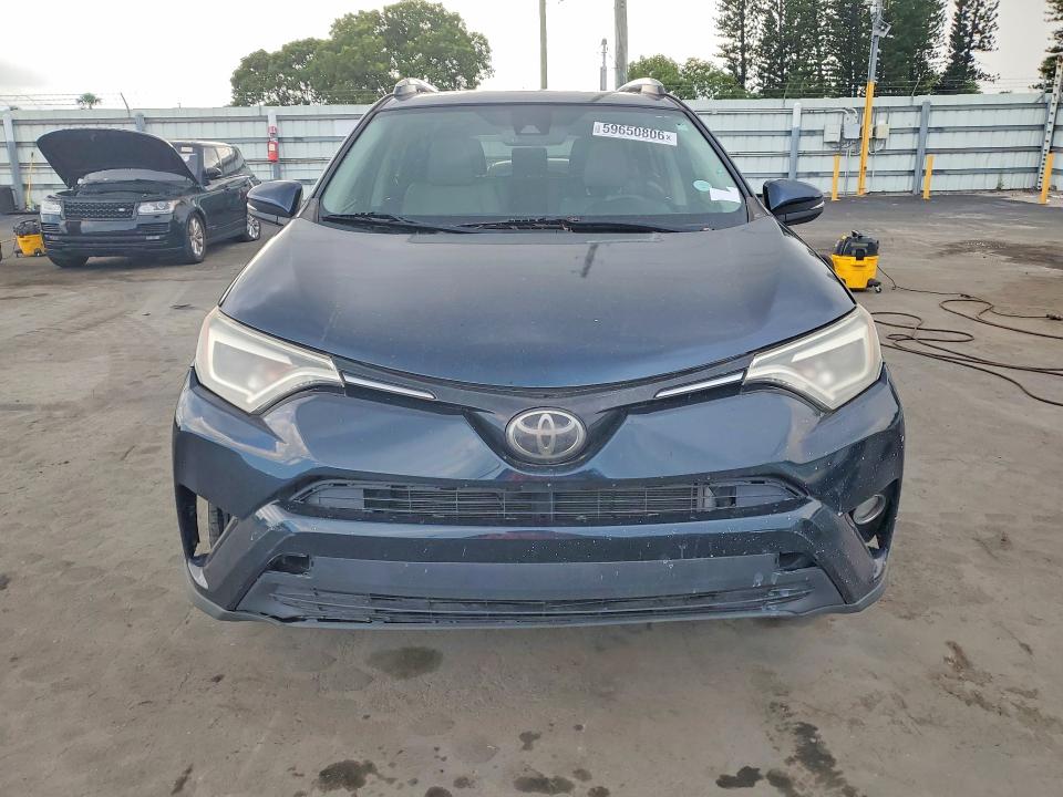 2018 Toyota Rav4 VIN JTMYFREV9JJ161744 COPART salvage auction — MECHANICAL, Fl - Certificate Of Title (P), sold $8,700 on 2026-07-28 (photo 5)