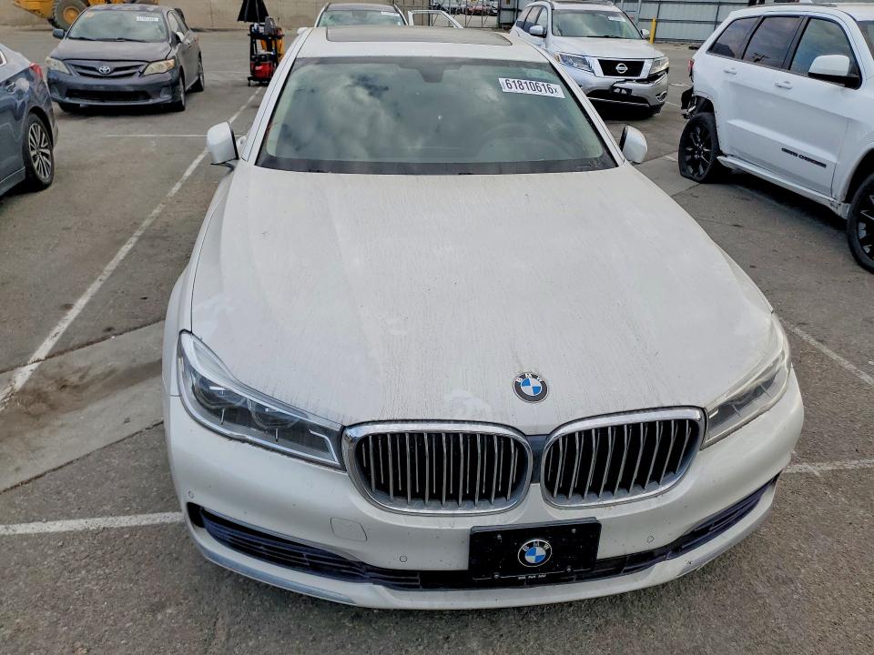 2016 BMW 7 series VIN WBA7F2C53GG415098 COPART salvage auction — NORMAL WEAR, IN - CERT OF TITLE-SALVAGE TITLE (P), sold $5,700 on 2026-08-18 (photo 5)