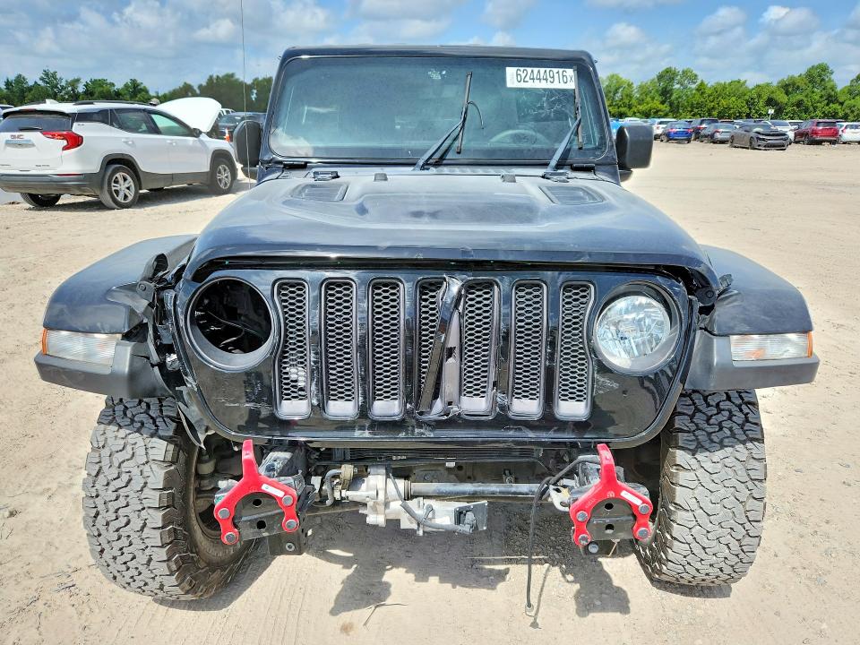 2023 Jeep Wrangler / VIN 1C4HJXFN0PW598657 COPART salvage auction — FRONT END, Tx - Salvage Vehicle Title, sold $11,300 on 2026-07-31 (photo 5)