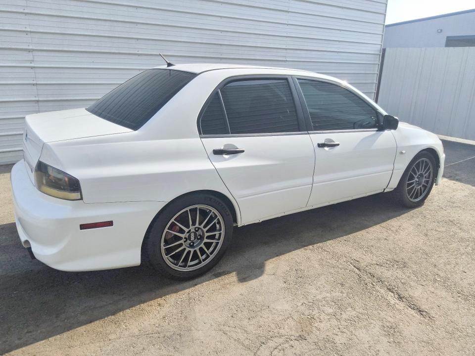 2005 Mitsubishi Evo VIN JA3AH36D75U044942 COPART salvage auction — MECHANICAL, CA - CERTIFICATE OF TITLE, sold $20,500 on 2026-08-20 (photo 3)
