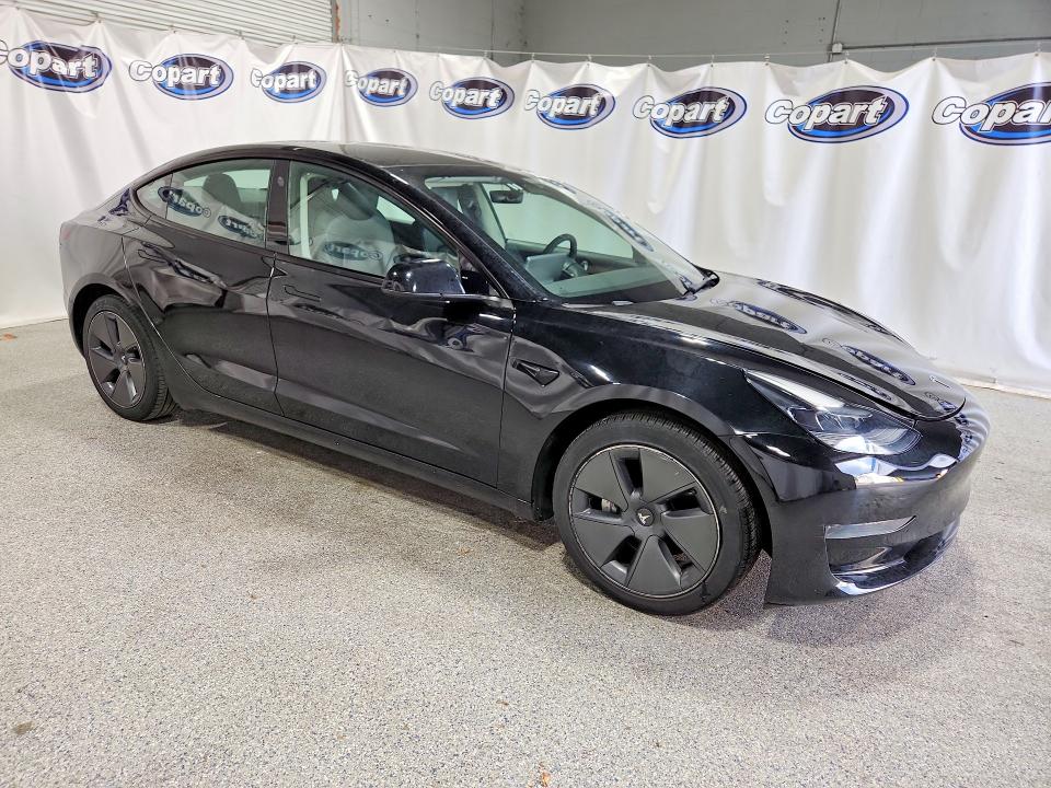 2022 Tesla Model 3 VIN 5YJ3E1EA0NF369004 COPART salvage auction — MECHANICAL, Fl - Certificate Of Title, sold $8,100 on 2026-08-03 (photo 4)