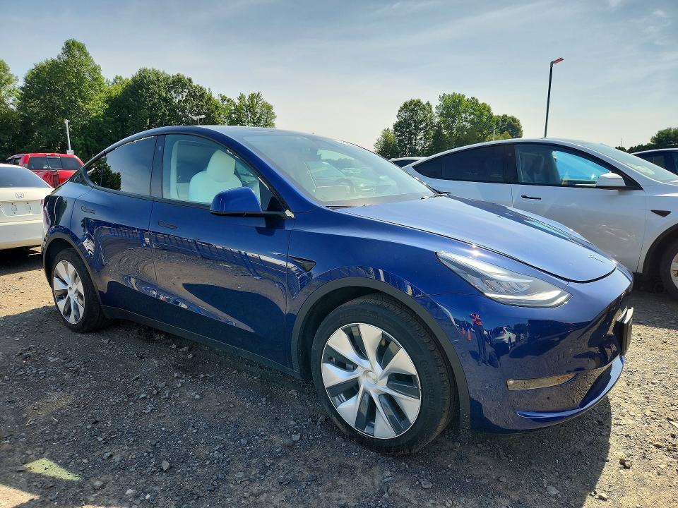 2022 Tesla Model y VIN 7SAYGDEEXNF418605 COPART salvage auction — REAR END, CT - CERT OF TITLE-SALVAGE, sold $12,200 on 2026-07-23 (photo 4)