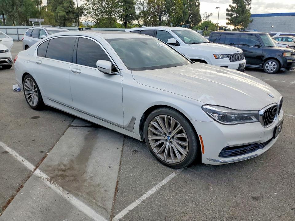 2016 BMW 7 series VIN WBA7F2C53GG415098 COPART salvage auction — NORMAL WEAR, IN - CERT OF TITLE-SALVAGE TITLE (P), sold $5,700 on 2026-08-18 (photo 4)