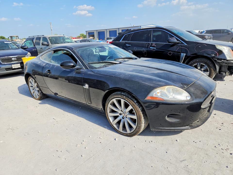 2009 Jaguar Xk VIN SAJWA43B195B29736 COPART salvage auction — MINOR DENT/SCRATCHES, TX - CERTIFICATE OF TITLE, sold $1,950 on 2026-07-31 (photo 4)