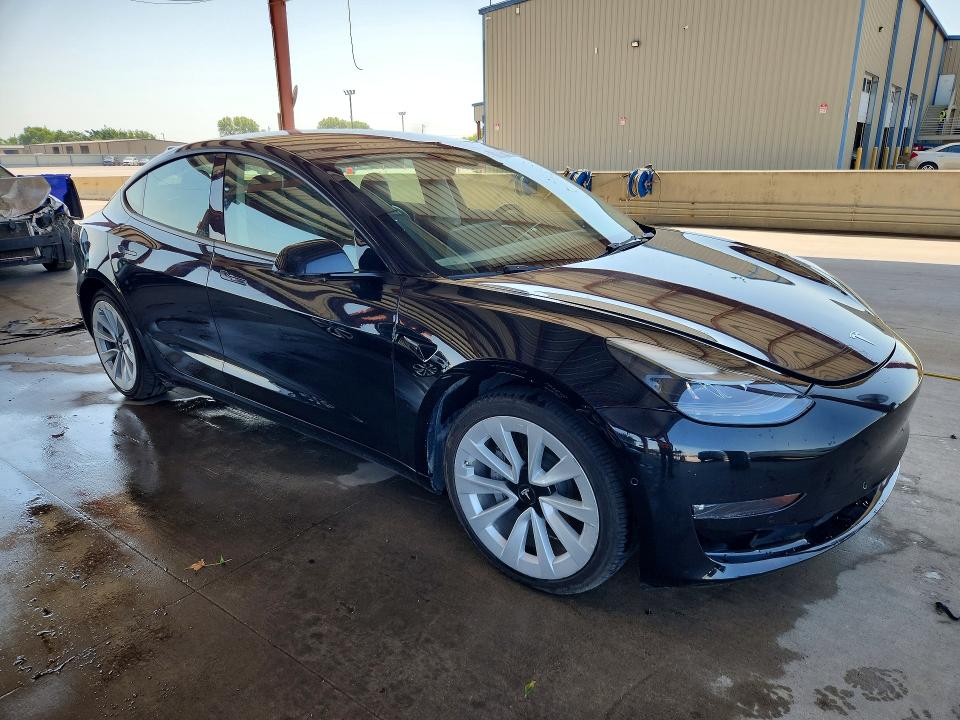 2022 Tesla Model 3 VIN 5YJ3E1EA4NF372049 COPART salvage auction — SIDE, Tn - Certificate Of Title, sold $9,600 on 2026-08-03 (photo 4)