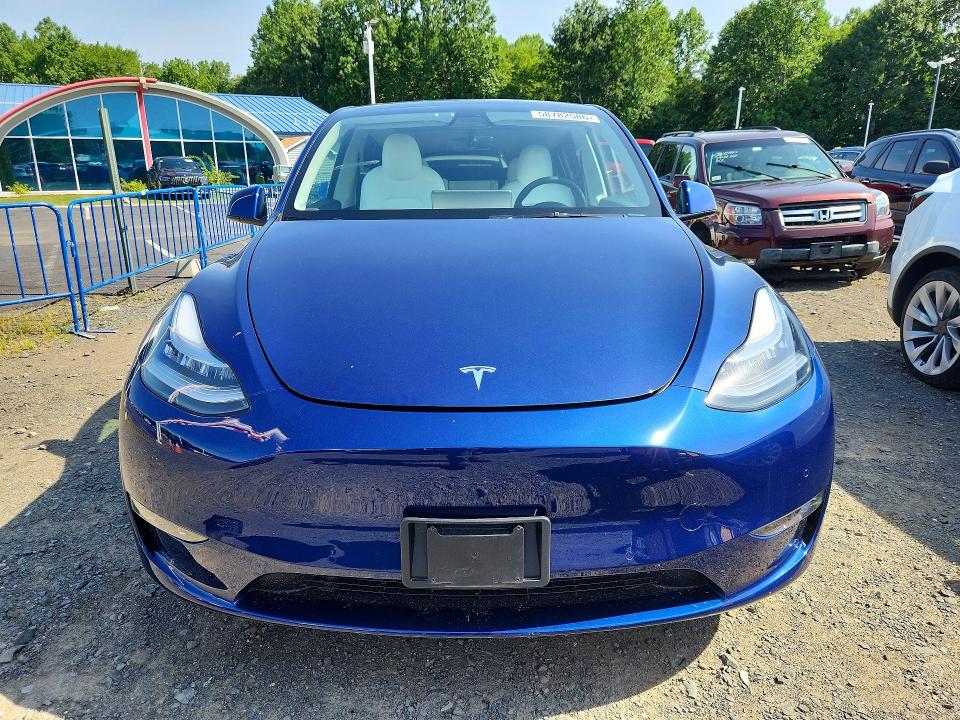 2022 Tesla Model y VIN 7SAYGDEEXNF418605 COPART salvage auction — REAR END, CT - CERT OF TITLE-SALVAGE, sold $12,200 on 2026-07-23 (photo 5)