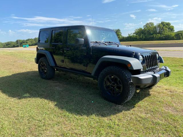 2016 Jeep Wrangler Unlimited VIN 1C4BJWDG7GL103053 COPART salvage auction — NORMAL WEAR, TX - CERT OF TITLE-REBLT SLVG FLOOD (P), sold $14,900 on 2023-09-14 (photo 1)