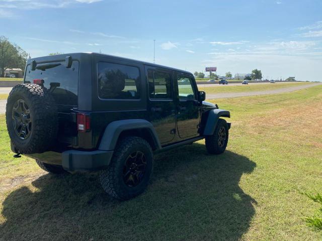 2016 Jeep Wrangler Unlimited VIN 1C4BJWDG7GL103053 COPART salvage auction — NORMAL WEAR, TX - CERT OF TITLE-REBLT SLVG FLOOD (P), sold $14,900 on 2023-09-14 (photo 4)