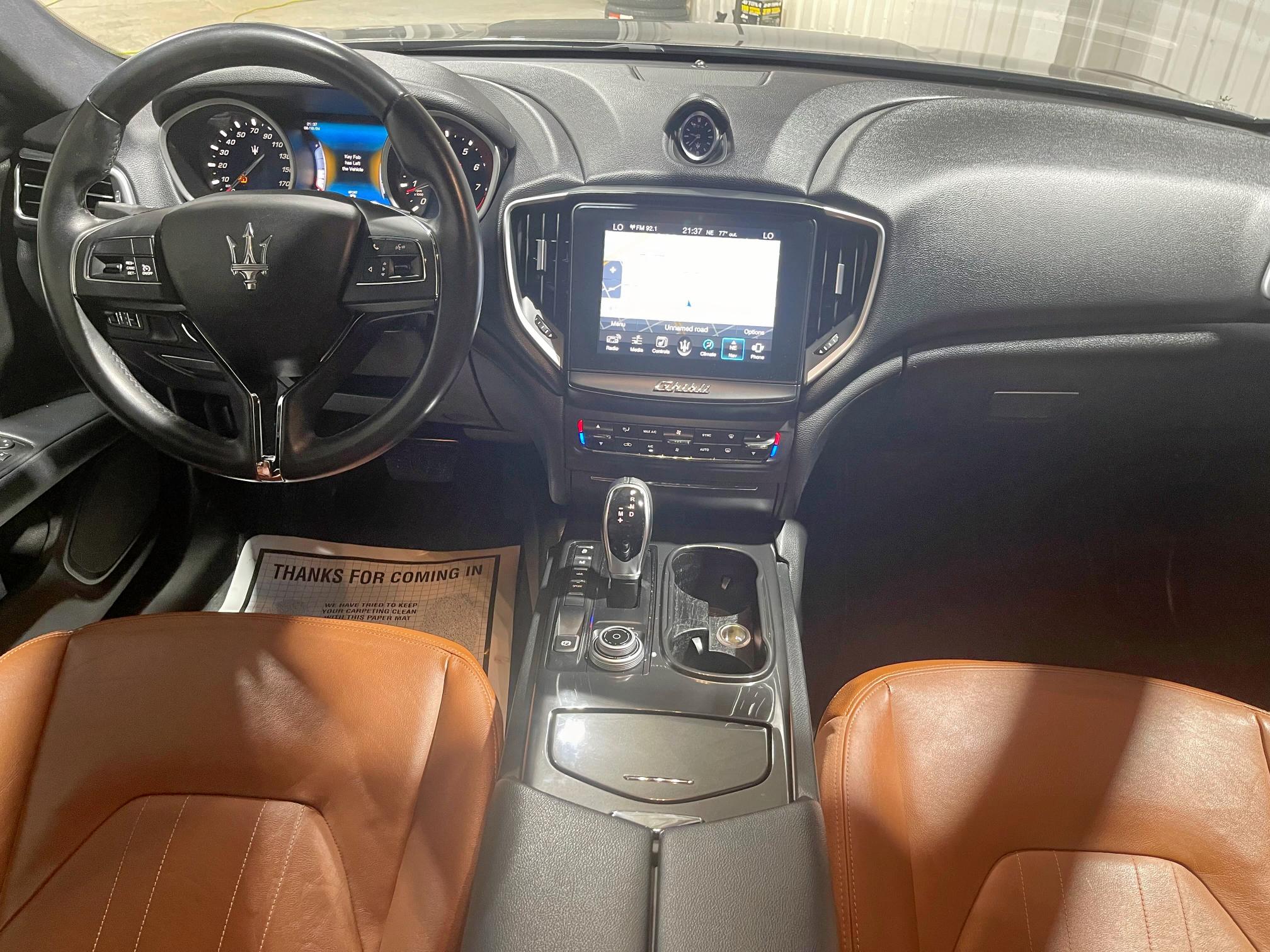 2017 Maserati Ghibli VIN ZAM57XSA9H1206127 COPART salvage auction — Damage History, TX - CERT OF TITLE-REBUILT SALVAGE (P), sold $30,500 on 2025-08-29 (photo 9)