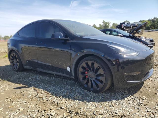 2023 Tesla Model y VIN 7SAYGDEF6PF863550 COPART salvage auction — WATER/FLOOD, Nj - Cert Of Title-Salvage Flood, sold $8,400 on 2026-07-27 (photo 4)