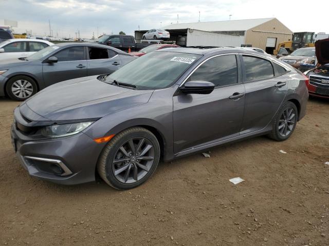 2019 Honda Civic VIN 19XFC1F34KE004653 COPART salvage auction — HAIL, Wy - Dis/Dlr/Exp Only Salvage Title, sold $500 on 2026-07-21 (photo 1)