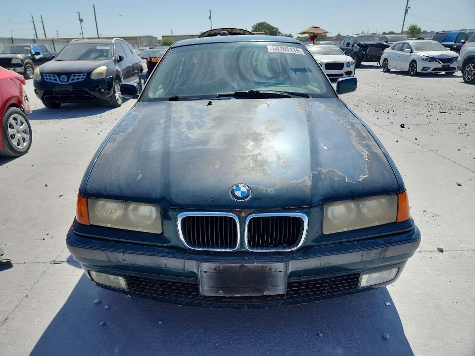 1997 BMW 3 series VIN WBACC0324VEK21285 COPART salvage auction — NORMAL WEAR, TX - CERTIFICATE OF TITLE, sold $175 on 2026-08-21 (photo 5)