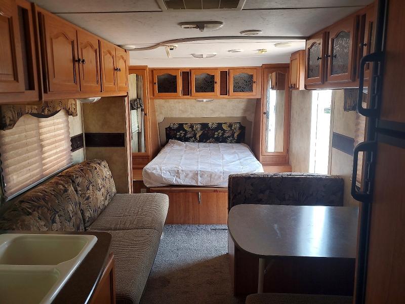 2010 Keystone rv Passport u VIN 4YDT24525AT413246 COPART salvage auction — SIDE, ST, sold $525 on 2026-10-01 (photo 5)