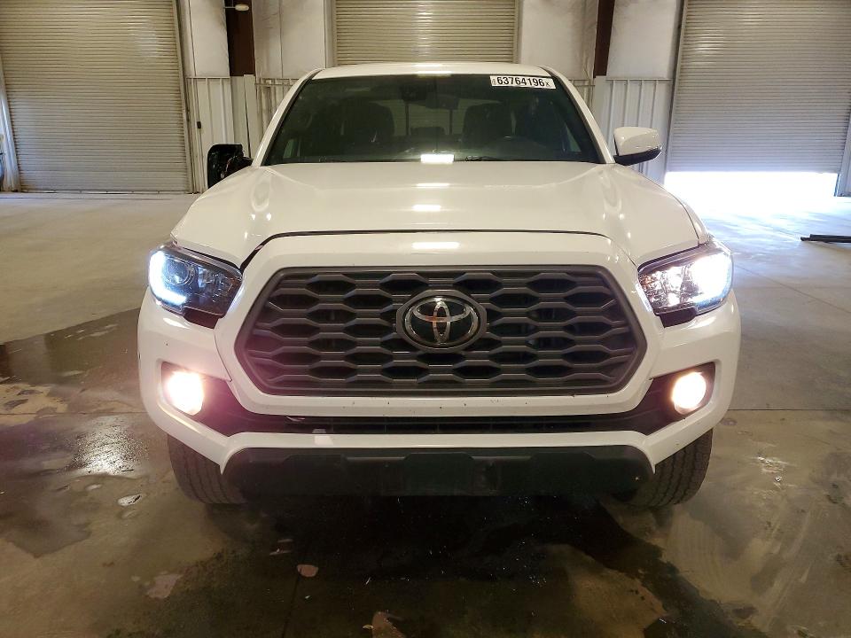 2023 Toyota Tacoma VIN 3TMCZ5AN7PM611225 COPART salvage auction — ROLLOVER, Mn - Cert Of Title-Salvage, sold $12,700 on 2026-08-24 (photo 5)