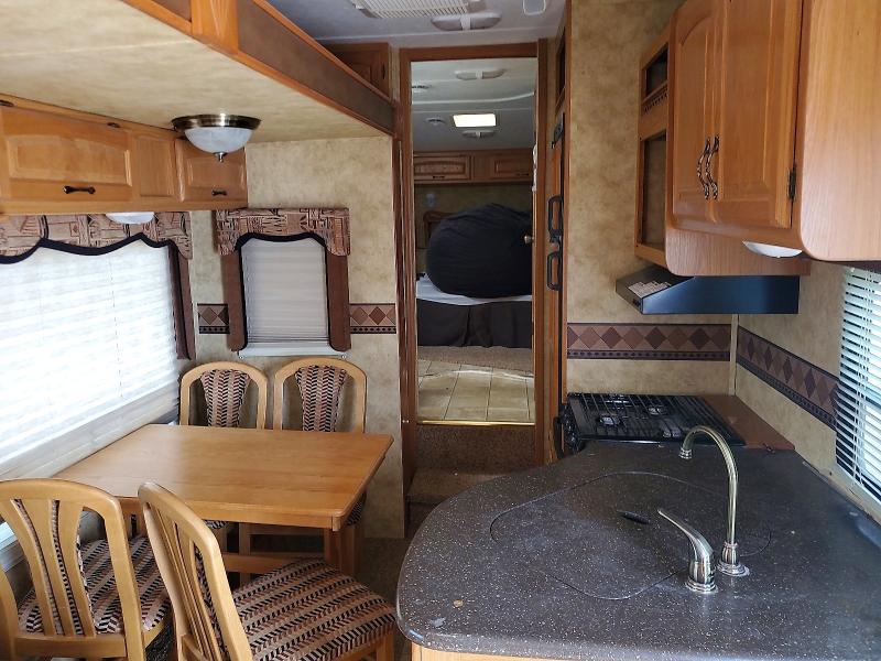 2009 Keystone Laredo VIN 4YDF265279L601027 COPART salvage auction — HAIL, SD - CERTIFICATE OF TITLE, sold $0 on 2026-10-03 (photo 5)