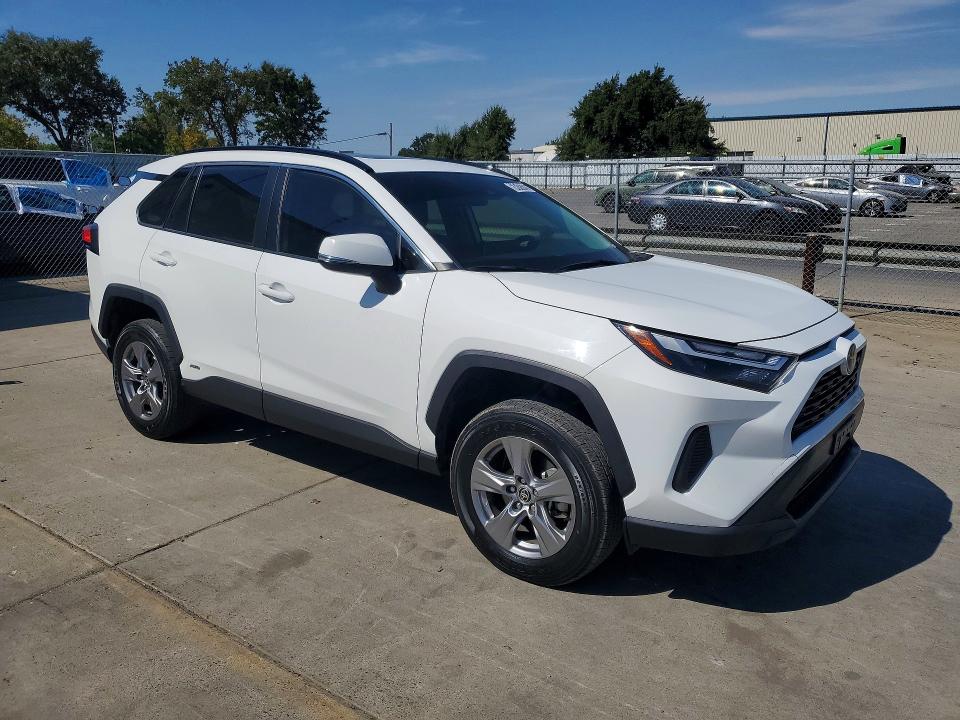 2023 Toyota Rav4 VIN JTMRWRFV8PD194941 COPART salvage auction — NORMAL WEAR, Ca - Dis/Dlr/Exp Only Clean Title (P), sold $32,500 on 2026-08-20 (photo 4)