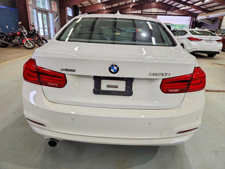 2016 BMW 3 series VIN WBA8E5G55GNT93037 COPART salvage auction — MINOR DENT/SCRATCHES, Mt - Certificate Of Title (P), sold $1,000 on 2026-08-20 (photo 6)