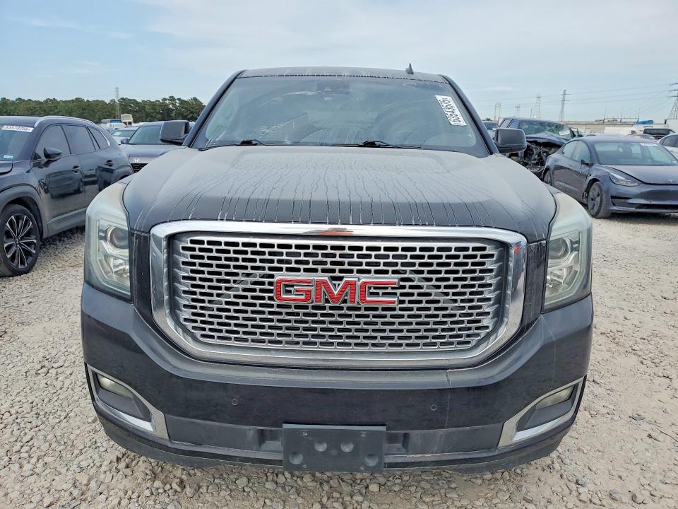 2015 Gmc Yukon VIN 1GKS1CKJ9FR176373 COPART salvage auction — NORMAL WEAR, TX - CERTIFICATE OF TITLE (P), sold $11,900 on 2026-08-21 (photo 5)