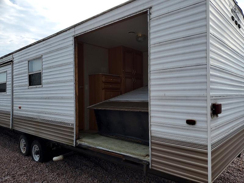 2003 Damon Breckenrid VIN 5DJTB0U2735003075 COPART salvage auction — ROOF, ST, sold $35 on 2026-09-03 (photo 7)