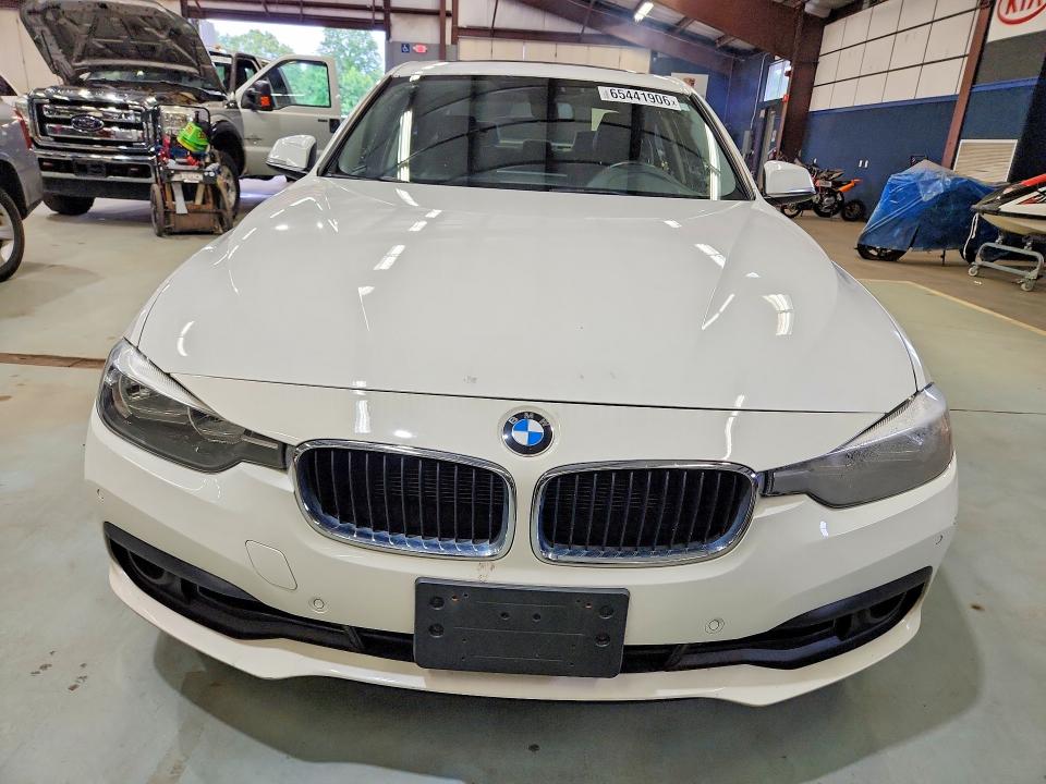 2016 BMW 3 series VIN WBA8E5G55GNT93037 COPART salvage auction — MINOR DENT/SCRATCHES, Mt - Certificate Of Title (P), sold $1,000 on 2026-08-20 (photo 5)
