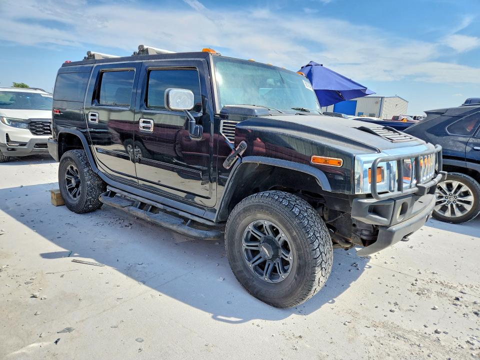 2003 Hummer H2 VIN 5GRGN23U53H120083 COPART salvage auction — NORMAL WEAR, MO - CERTIFICATE OF TITLE, sold $2,500 on 2026-09-22 (photo 4)