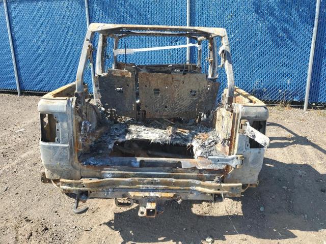 2023 Jeep Wrangler / VIN 1C4HJXEG2PW599831 COPART salvage auction — BURN, Nb - Bill Of Sale Non-Repairable, sold $325 on 2026-07-02 (photo 6)