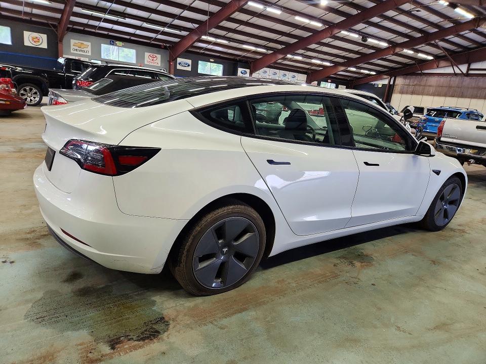 2023 Tesla Model 3 VIN 5YJ3E1EA1PF580571 COPART salvage auction — SIDE, Va - Certificate Of Title (P), sold $16,900 on 2026-10-15 (photo 3)