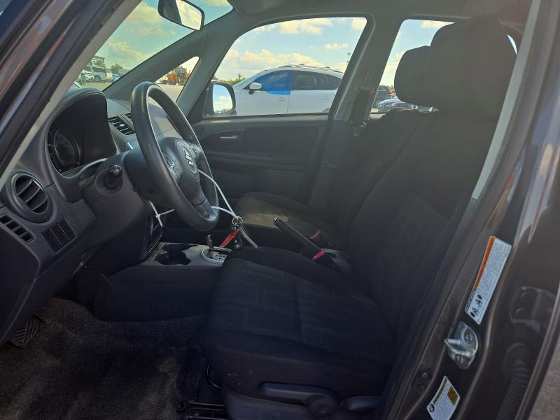 2010 Suzuki Sx4 VIN JS2YB5A3XA6310065 COPART salvage auction — MECHANICAL, FL - CERTIFICATE OF TITLE, sold $375 on 2026-10-16 (photo 7)