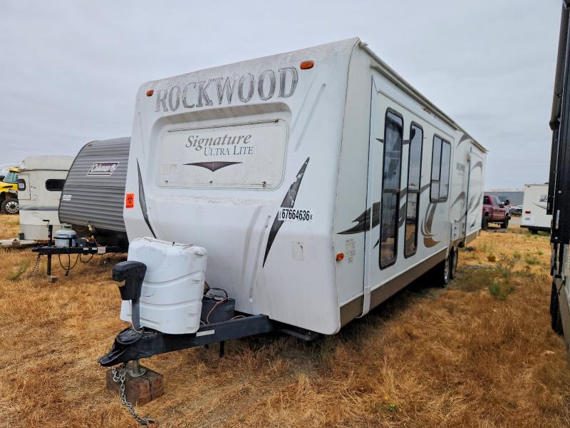 2012 Rockwood Trailers VIN 4X4TRLG25C1843700 COPART salvage auction — MINOR DENT/SCRATCHES, DV, sold $325 on 2026-09-15 (photo 2)