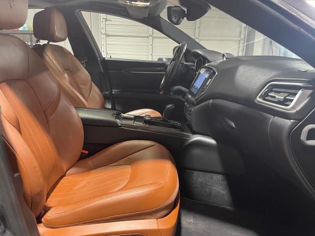 2017 Maserati Ghibli VIN ZAM57XSA9H1206127 COPART salvage auction — NORMAL WEAR, TX - CERT OF TITLE-REBUILT SALVAGE (P), sold $23,900 on 2025-01-03 (photo 5)